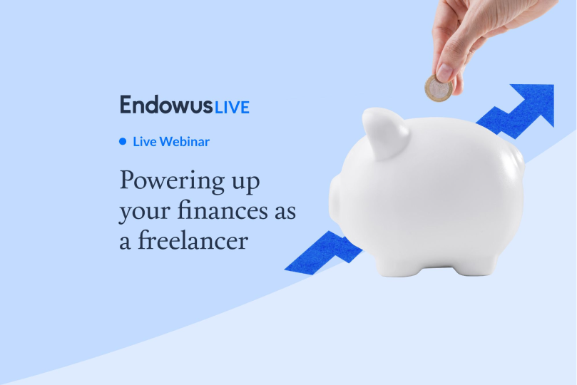 hand putting coin into piggy bank